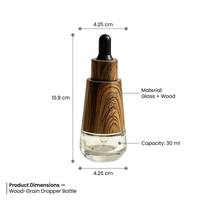 Flacon compte-gouttes OEM personnalisé 30 ml en verre de luxe à grain de bois, avec manchon en bois de café et bulbe en caoutchouc pour bouteilles d'huiles essentielles