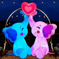 Ornement de jardin romantique pour la Saint-Valentin, couple d'éléphants gonflables tenant un ballon en forme de cœur avec LED