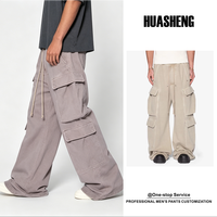 Vente directe d'usine hommes Baggy Cargo pantalons de survêtement couleur foncée froissé respirant hommes Cargo pantalon avec poche décoration