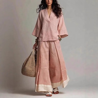 Nouvelle collection 2026 : Ensemble pantalon large et chemise à manches trois-quarts col en V style français en polyester et élasthanne pour femme, idéal pour l'export.