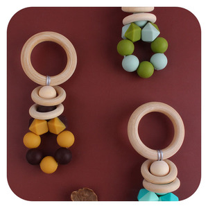 Nouveau bricolage créatif <span class=keywords><strong>anneau</strong></span> en bois <span class=keywords><strong>Gel</strong></span> <span class=keywords><strong>de</strong></span> <span class=keywords><strong>dentition</strong></span> bébé apaisant bicolore Silicone jouet pour grincer des dents - Product Image 5