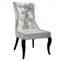 Chaises de salle à manger élégantes de style américain en cuir blanc rembourré avec structure métallique pour restaurants et hôtels QL8001
