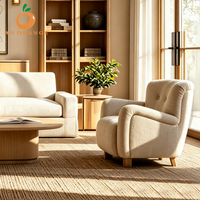 Fauteuil individuel haut de gamme pour salon, avec accoudoirs effilés, revêtement en tissu, pieds en chêne massif, idéal pour appartement et villa
