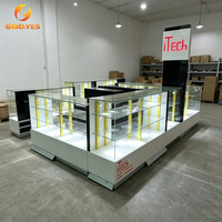 Vitrine en verre haut de gamme pour magasin de téléphonie mobile, présentoir modulaire en îlot avec éclairage LED pour boutique de détail