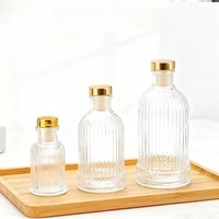 Flacons de parfum en verre d'aromathérapie de 50 ml/100 ml/150 ml/200 ml, cylindre, diffuseur en relief, finition mate sérigraphiée, vis