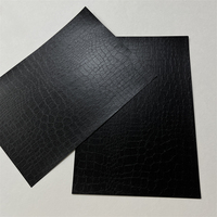Feuille de papier gaufré effet crocodile noir 120 g/m², recto brillant, papier spécial cartonné