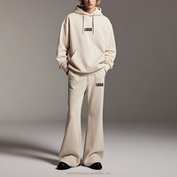 Streetwear OEM personnalisé Ensemble surdimensionné 2 pièces en coton vierge uni Survêtement Sweat à capuche évasé et pantalon de survêtement pour hommes