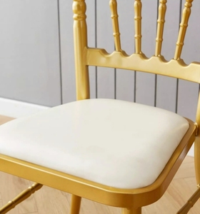 Dominate nuevo diseño de lujo oro de acero inoxidable espalda cruzada banquete Silla de boda con almohadillas blancas de PU - Product Image 1