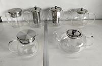 Théière en verre borosilicate de 600 ml, faite à la main, écologique, compatible avec les plaques de cuisson, avec une grande poignée et un infuseur pour thé en feuilles.