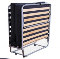Cadre de lit pliant minimaliste en métal rangement facile et 4 roulettes pour chambre portable