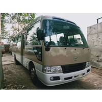 Mini-bus Toyota Coaster d'occasion 30 places, essence, importé du Japon, pour la vente aux entreprises de tourisme et de location