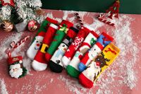 4 paires de chaussettes de Noël en polaire corail tricotées, chaudes pour l'hiver, unisexe, dans une boîte cadeau