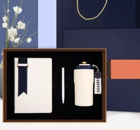 Ensemble cadeau de bloc-notes noir, stylo et porte-clés pour événements d'entreprise, personnalisation de la marque et commandes en gros