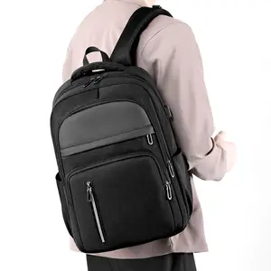 2024定制标志防水笔记本背包商务男士旅行背包大容量学校背包带USB