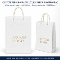Sac en papier personnalisé de luxe avec logo en feuille d'or, mat, gaufré, laminé, grand, moyen, blanc, solide, pour magasin de vêtements, sac de shopping