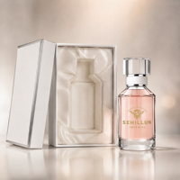 Flacon de parfum de luxe avec pompe pulvérisatrice chromée, collier cordonné et base en verre massif lourd