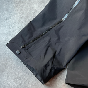 Pantalones de chándal de poliéster de nailon sueltos negros de alta calidad personalizados con cremallera de gran tamaño para hombre - Product Image 1