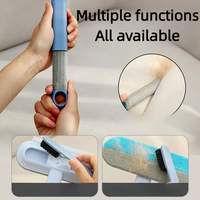 Vente directe d'usine, brosse double face multifonctionnelle, nouvelle conception, haute qualité, ABS, pour nettoyer les tapis, les canapés, les lits, les poils d'animaux
