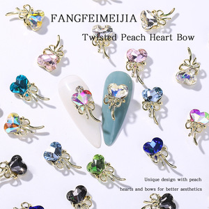 Vendita calda ciondoli a forma di cuore con ciondoli con strass gemme di cristallo oro metallo farfalla arco a forma di cuore <span class=keywords><strong>pietre</strong></span> e cristalli <span class=keywords><strong>per</strong></span> unghie - Product Image 2