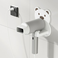 Support mural adhésif sans perçage pour sèche-cheveux, organisateur de rangement pour armoire, accessoires de salle de bain mignons, vente en gros Ningbo