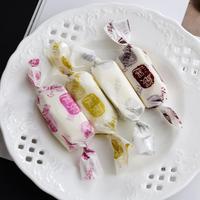 Papier ciré Emballages alimentaires Papier sulfurisé antiadhésif en silicone pour huile Emballages de nougat Emballages de bonbons pour collations