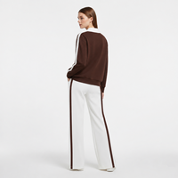 Ensemble de survêtement pour femme à manches courtes, veste courte zippée, pantalon de survêtement à jambes larges avec rayures latérales et boutons-pression, vente en gros