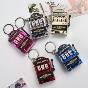 Porte-clés machine à sous Las Vegas rose, mini modèle fonctionnel avec poignée, cadeau souvenir pour les amateurs de casino et les collectionneurs - Product Image 1