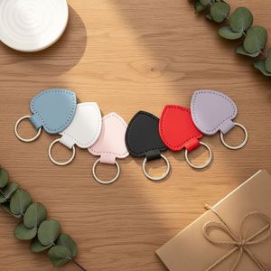 Porte-clés en cuir PU en forme de cœur pour couple, homme et femme, gaufré, durable, cadeau d'affaires, pendentif - Product Image 4