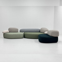 Canapé modulaire Chinnovation moderne et créatif en tissu de forme ovale avec rembourrage en éponge pour salon de villa et hall d'hôtel