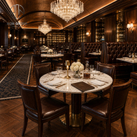 Meubles de restaurant de luxe Ron Group, table ronde en marbre, chaise rembourrée avec structure en bois, banquette en cuir capitonnée