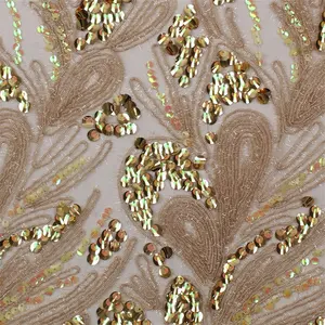Tissu de dentelle de broderie d'or de maille pour des robes de mariage africaines, mode de paillettes, dernière conception