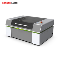 Machine de gravure laser universelle à bon prix pour la vente au détail Yueming Machine de découpe laser Co2 à vendre