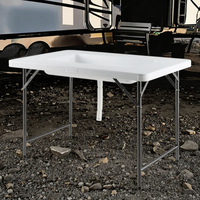 Vente en gros en usine Table de remplissage et de refroidissement pliante en plastique blanc de 4 pieds avec étagère de service pour les événements de camping en plein air