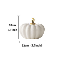 Ensemble de décorations d'intérieur en céramique en forme de citrouille, style luxueux discret, orange/blanc, avec des accents dorés brillants