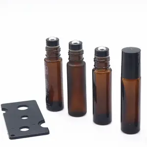 उच्च गुणवत्ता एम्बर 10ML ग्लास बोतलों पर रोल के साथ काले आवास स्टेनलेस स्टील रोलर गेंद के लिए आवश्यक तेलों