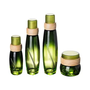 Barattolo di vetro verde da 50ml 50g 100ml 120ml con coperchio in bambù barattolo di crema di vetro barattoli cosmetici con coperchio in legno di bambù di plastica