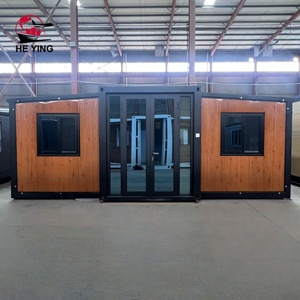 Maison conteneur modulaire préfabriquée extensible à double aile de 20 pieds Kit de cabine prête à l'emploi à 2 chambres Design chinois - Product Image 1