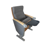 Chaise de théâtre pliante de chaise de hall d'auditorium de prix usine avec le bloc-notes couverture en tissu en cuir sièges de cinéma de coquille en bois