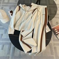 Costume pantalon deux pièces décontracté pour femme, uni, respirant, 100% polyester, fermeture éclair, manches longues, longueur midi, coupe régulière, à capuche, automne