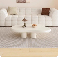 Table basse minimaliste et tendance 'Cloud' de style scandinave, luxe léger, forme unique, style Wabi-Sabi pour salon, chambre et maison