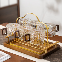Tasse en verre exquise, parfaite pour le thé aux fleurs, le café latte art ou les boissons quotidiennes ; design élégant et attrayant.