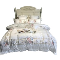 Nouvel ensemble de literie de luxe en coton égyptien brodé de fleurs, 4 pièces, housse de couette douce, drap plat avec deux taies d'oreiller