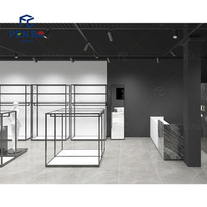 Bastidores de ropa personalizados para tiendas de ropa Soluciones de exhibición de venta al por menor duraderas Diseño de interiores de tienda de ropa de mujer - Product Image 5