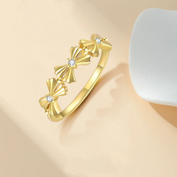 Glowluxe S925 Bague de chevalière en argent sterling avec nœud serti invisible plaqué or Bijoux tendance pour femmes