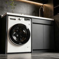 Meuble de buanderie en aluminium gris foncé avec lave-linge intégré, évier et plan de travail à double porte pour balcon et salle de bain