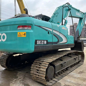 รถขุดขนาดเล็ก Kobelco SK210LC มือสอง น้ำหนักใช้งาน 22 ตัน พร้อมเครื่องยนต์ Cummins เกียร์ Kawasaki ปั๊ม และลูกปืน - Product Image 1