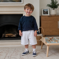 Pantalon de sport pour enfants, coupe droite, mi-mollet, taille élastique, en polyester/coton respirant, léger et doublé, idéal pour l'été et le quotidien.