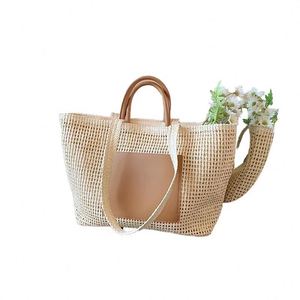 กระเป๋าถือชายหาดทรงสวย ขนาดใหญ่ จุของได้เยอะ มีหูหิ้วสองข้าง ทำด้วยมือจากวัสดุหวาย กระเป๋าสะพายไหล่สานสำหรับผู้หญิง - Product Image 1