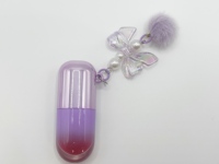 Gloss à lèvres hydratant repulpant végétalien changeant de couleur avec paillettes et bracelet nœud perlé