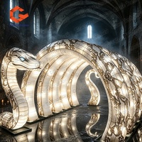 Arche gonflable personnalisée en forme de serpent, série serpent gonflable noir et or, pour la décoration de scène de festival de musique